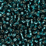 Perles de rocaille Toho 11/0 #27BD Silver Lined Teal 8-9g Flacon