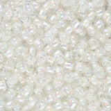 Perles de rocaille Toho 11/0 #777 Flacon de cristal arc-en-ciel doublé de crème 8-9g