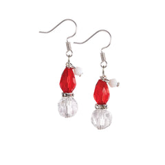 Close-up of the Santa earring pair with silver hooks, red beads and faceted clear drops