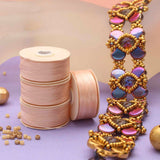 Bobine Nymo Thread B rose bébé 65 m