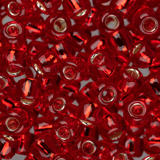 Perles de rocaille Toho 6/0 #25C Silver Lined Ruby 8-9g Flacon