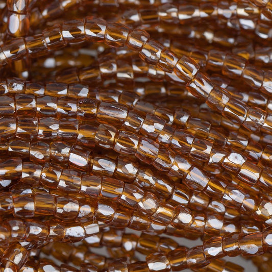 10/0 Czech 3 Cut Seed Beads Transparent Luster Madeira Topaz Hank