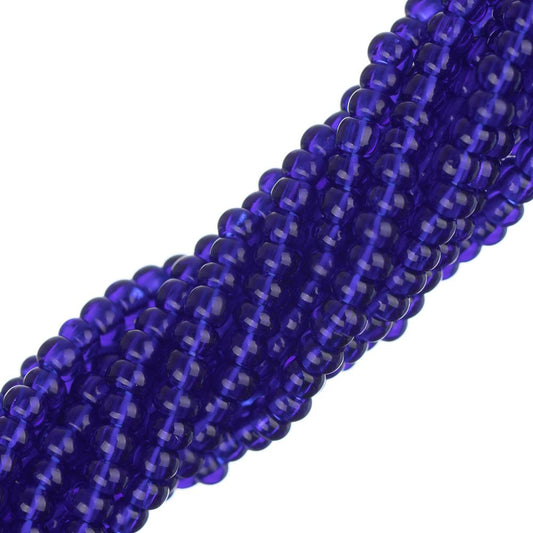 Perles de rocaille tchèques 11/0 #34939 bleu royal transparent 12 brins Hank