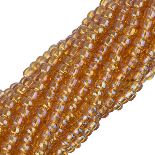 Perles de rocaille tchèques 11/0 #34944 Topaze transparente AB 12 brins Hank