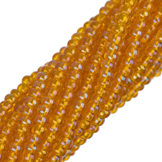 Perles de rocaille tchèques 11/0 #34949 orange clair transparent AB 12 brins Hank