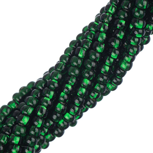 Perles de rocaille tchèques 11/0 #34981 vert foncé doublé d'argent 6 brins Hank
