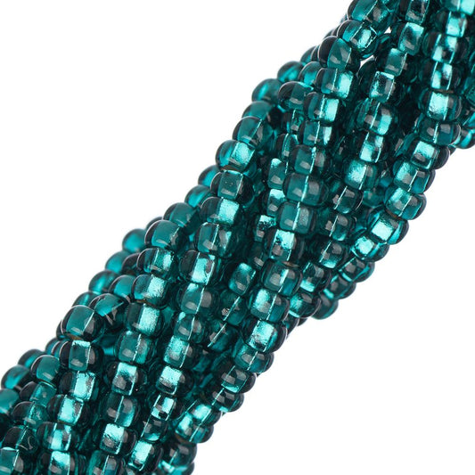 Perles de rocaille tchèques 11/0 #34982 vert sarcelle doublé d'argent 12 brins Hank