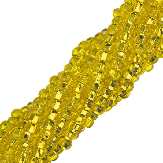 Perles de rocaille tchèques 11/0 #34985 jaune doublé d'argent 6 brins Hank