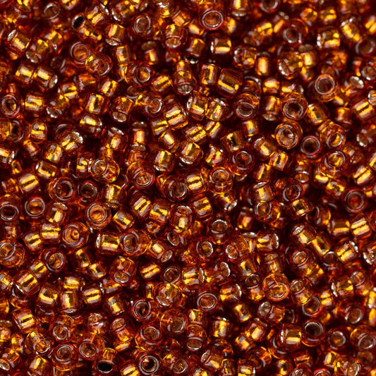 Perles de rocaille Toho 15/0 #2208 Silver Lined Burnt Orange 8-9g Flacon