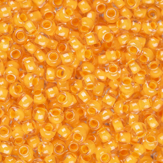 Perles de rocaille Toho 11/0 #962 Flacon de cristal doublé de pêche 8-9g