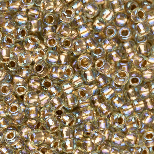 Perles de rocaille Toho 11/0 #998 Flacon de jonquil clair arc-en-ciel doublé d'or 8-9g