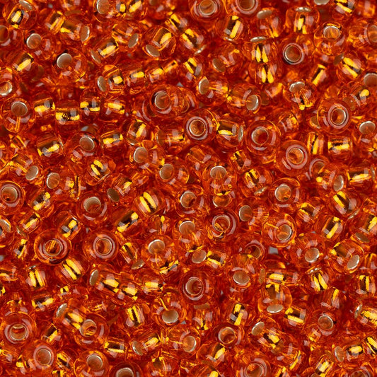 Perles de rocaille tchèques 11/0 #34983B orange doublé d'argent 250g